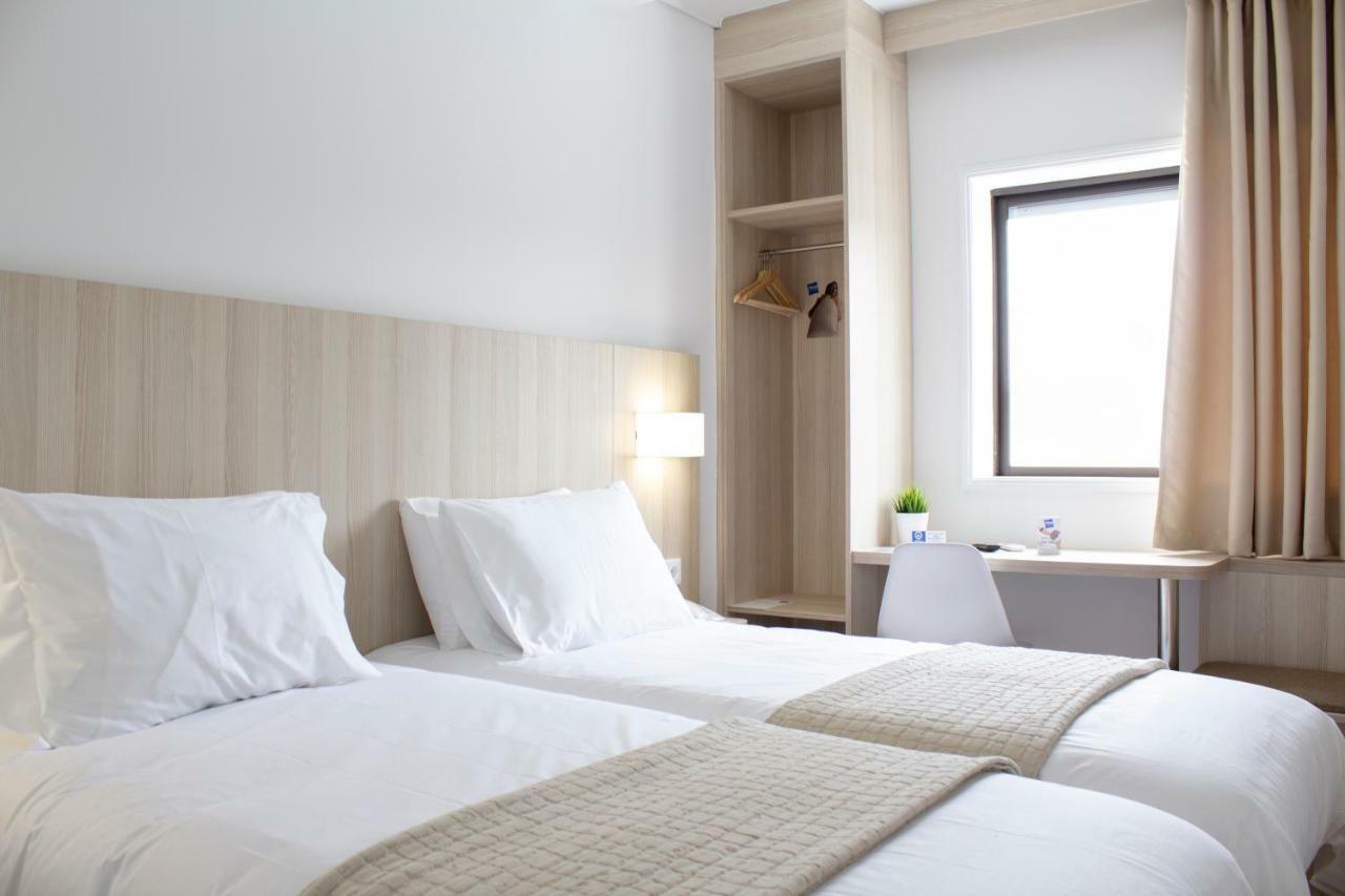 Up Hmb Hotels Fermentelos Luaran gambar